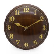 An Arts and Crafts oak wall clock,