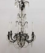 A French six-light brass and cut-glass chandelier,