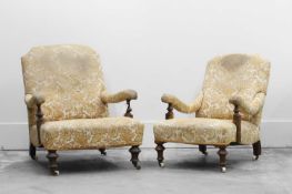 A pair of Victorian ladies and gentleman's open armchairs,