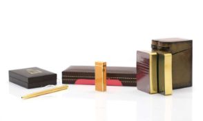 A Dunhill gold plated ball point pen,