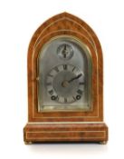 A burr walnut and ivory inlay mantel clock by Winterhalder & Hofmeier,