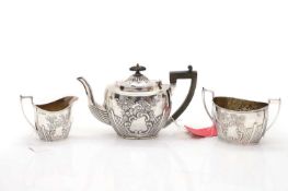 A silver three-piece tea service,