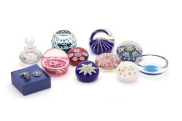 A group of glass paperweights,