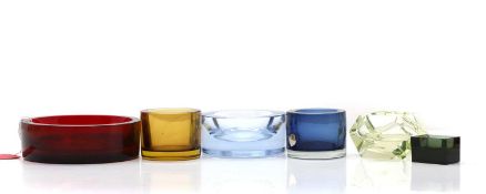 A group of glass vases or bowls,