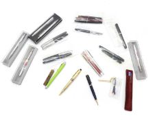 A Montblanc roller ball pen with reeded gilt metal body,