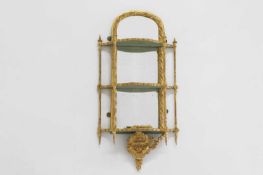A set of Victorian gilt composition hanging shelves,