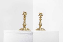 A pair of gilt-bronze candlesticks,