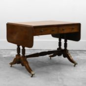 A Regency rosewood and brass inlaid sofa table,