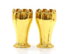 A pair of silver gilt vases,