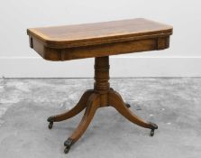 A Regency mahogany fold-over card table,