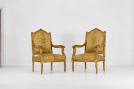 A pair of Louis XVI-style carved giltwood fauteuils,
