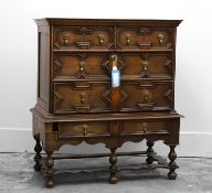 An oak chest on stand,