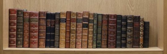 FINE BINDING: A Large quantity of leather bound books.