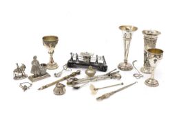 A collection of Chinese and Indian silver miniature items,