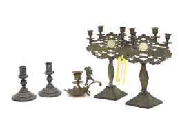 A pair of Chinese brass candlebra,