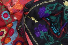 A collection of three Kyrgyzstani/Uzbek suzanis,