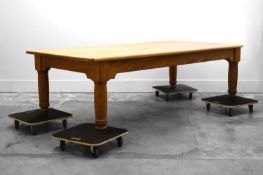 A large beechwood and pine kitchen table,