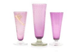 A set of three Stevens & Williams glass vases,