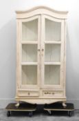 A white painted armoire,