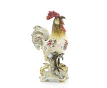 A French Nove faience cockerel centrepiece,