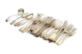 A collection of silver forks,