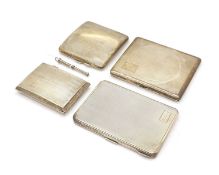 A group of four silver cigarette cases,