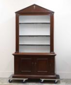 A mahogany open front bookcase,