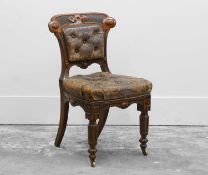 A Gothic oak side chair,