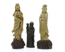 A pair of soapstone figures of Guanyin,