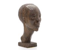 An African carved hardwood bust,