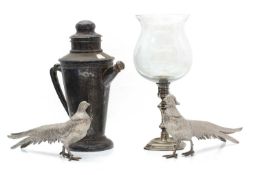 A silver plated cocktail shaker,