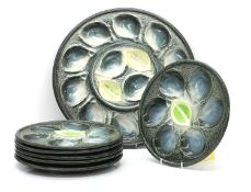 A set of seven French St Clement oyster dishes,