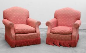 A pair a traditional armchairs,