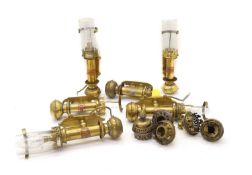 A collection of brass railway lanterns,