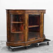 A Victorian walnut serpentine glazed credenza,