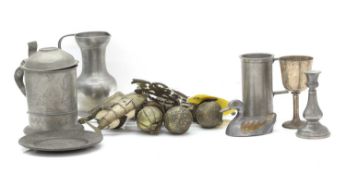 A collection of mixed antique and later pewter,