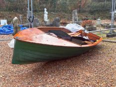 A plywood dingy,
