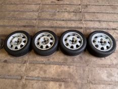 A set of four Peugeot 205 1.9 GTi alloy wheels,