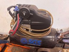An SGS workshop air compressor,