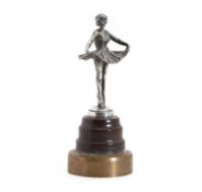 A car mascot in the form of a ballerina,