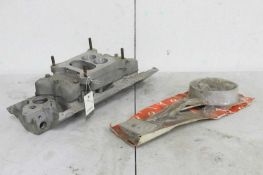 An Offenhauser inlet manifold,