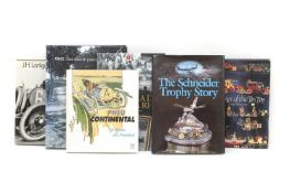 A collection of motoring books,