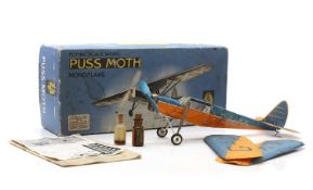 A De Havilland DH-80A 'Puss Moth' scale flying model,