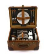 A leather-cased picnic set by M Worzl and Söhne,