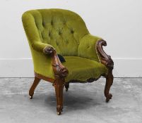 A Victorian carved rosewood armchair,