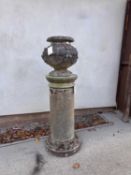 A reconstituted stone garden urn on stand,