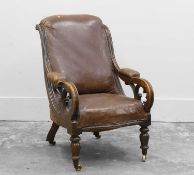 A walnut library armchair,