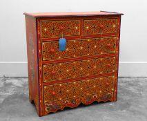 A Tibetan style polychrome painted chest of drawers,