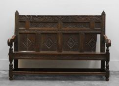 An oak settle,