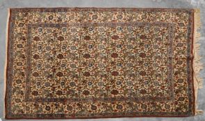 A near pair of hand knotted Persian rugs,